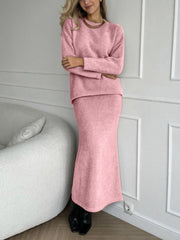 Blush pink textured knit co-ord set with relaxed silhouette, crew neck top and maxi skirt.