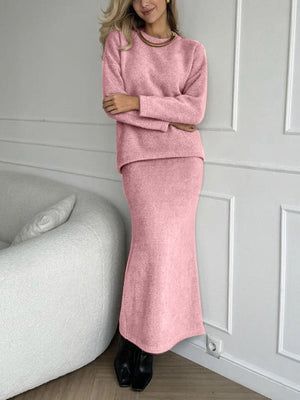 Blush pink textured knit co-ord set with relaxed silhouette, crew neck top and maxi skirt.
