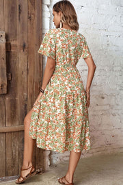 Flutter sleeve floral midi dress with tiered skirt and cinched waist