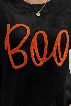 Black crewneck sweater with orange "Boo" appliqué detail