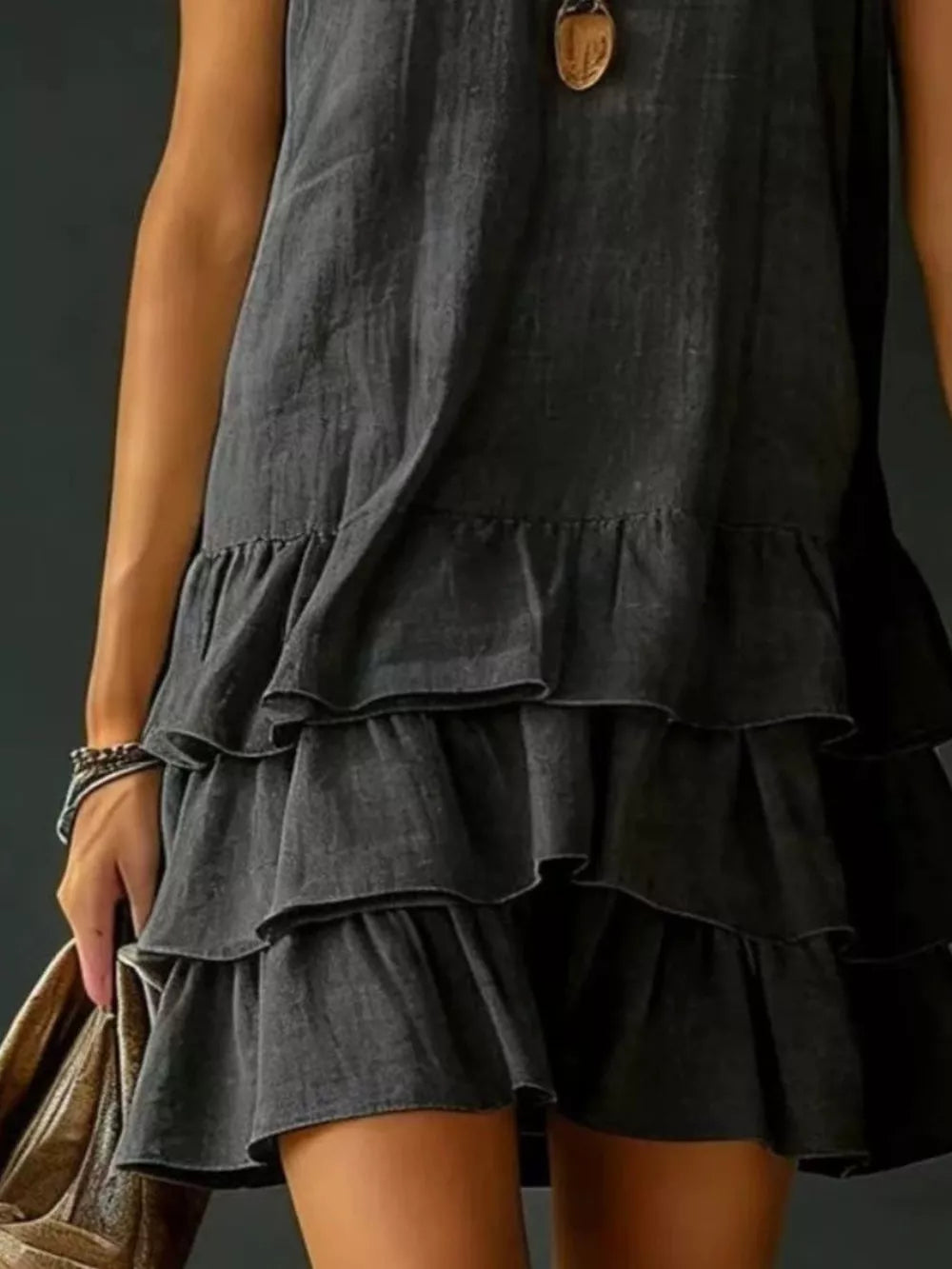 Grey tiered ruffled hem v-neck dress with a casual, airy feel.