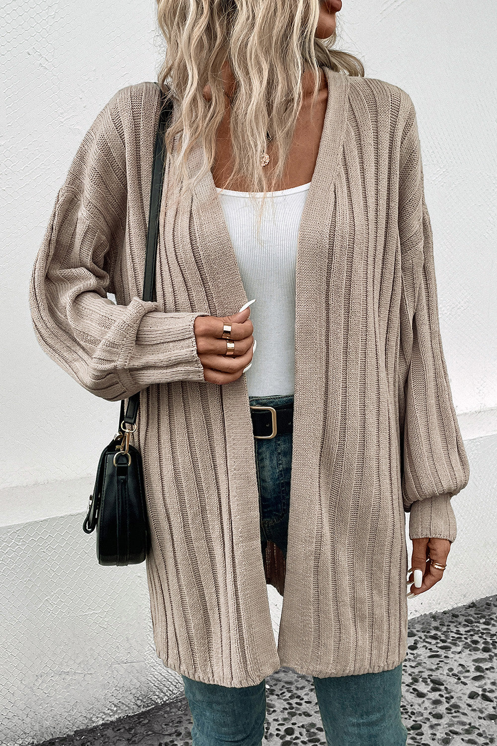 Khaki ribbed knit open front cardigan with long sleeves and pockets.