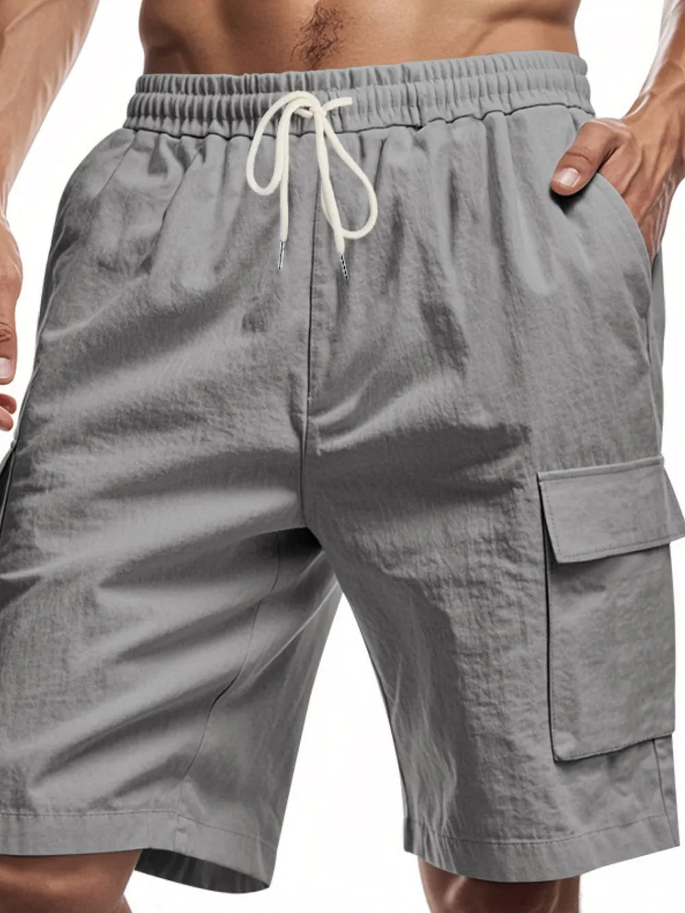 Dark gray relaxed fit drawstring shorts with utility cargo pocket and elastic waistband.