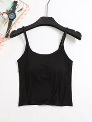 Black adjustable cami with spaghetti straps, basic style.