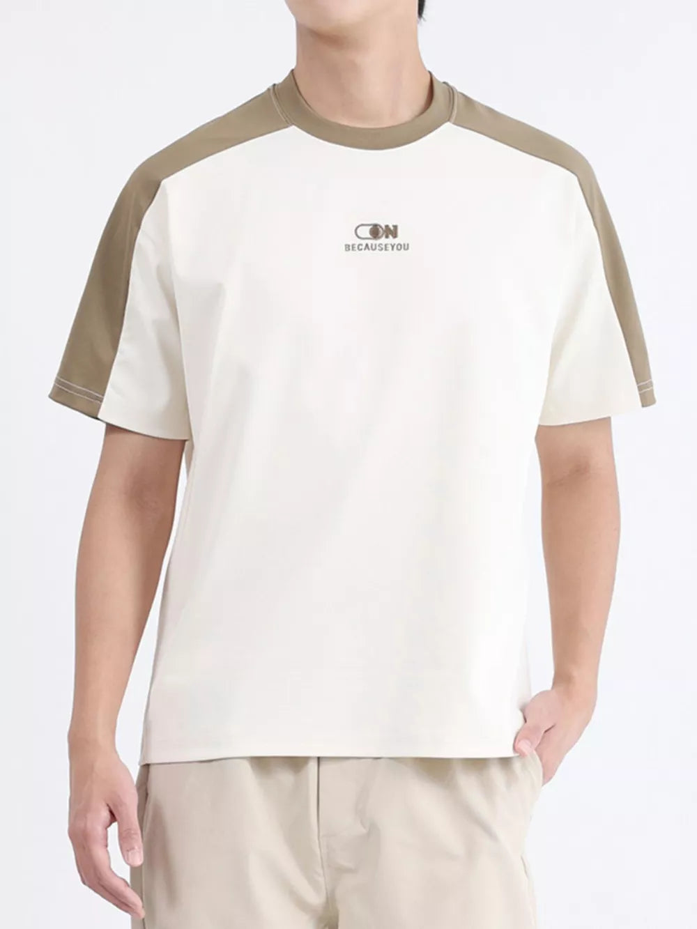 Men's contrast stitch t-shirt in cream with desert color sleeves and neckline.