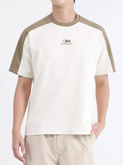 Men's contrast stitch t-shirt in cream with desert color sleeves and neckline.