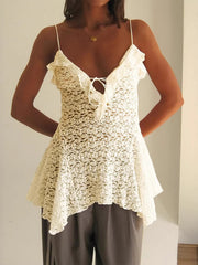 Lace ruffle tie-front cami top in beige with spaghetti straps and asymmetrical hem.