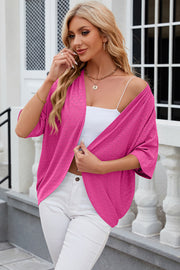 Hot Pink open-front crochet kimono sleeve top with a circular pattern.