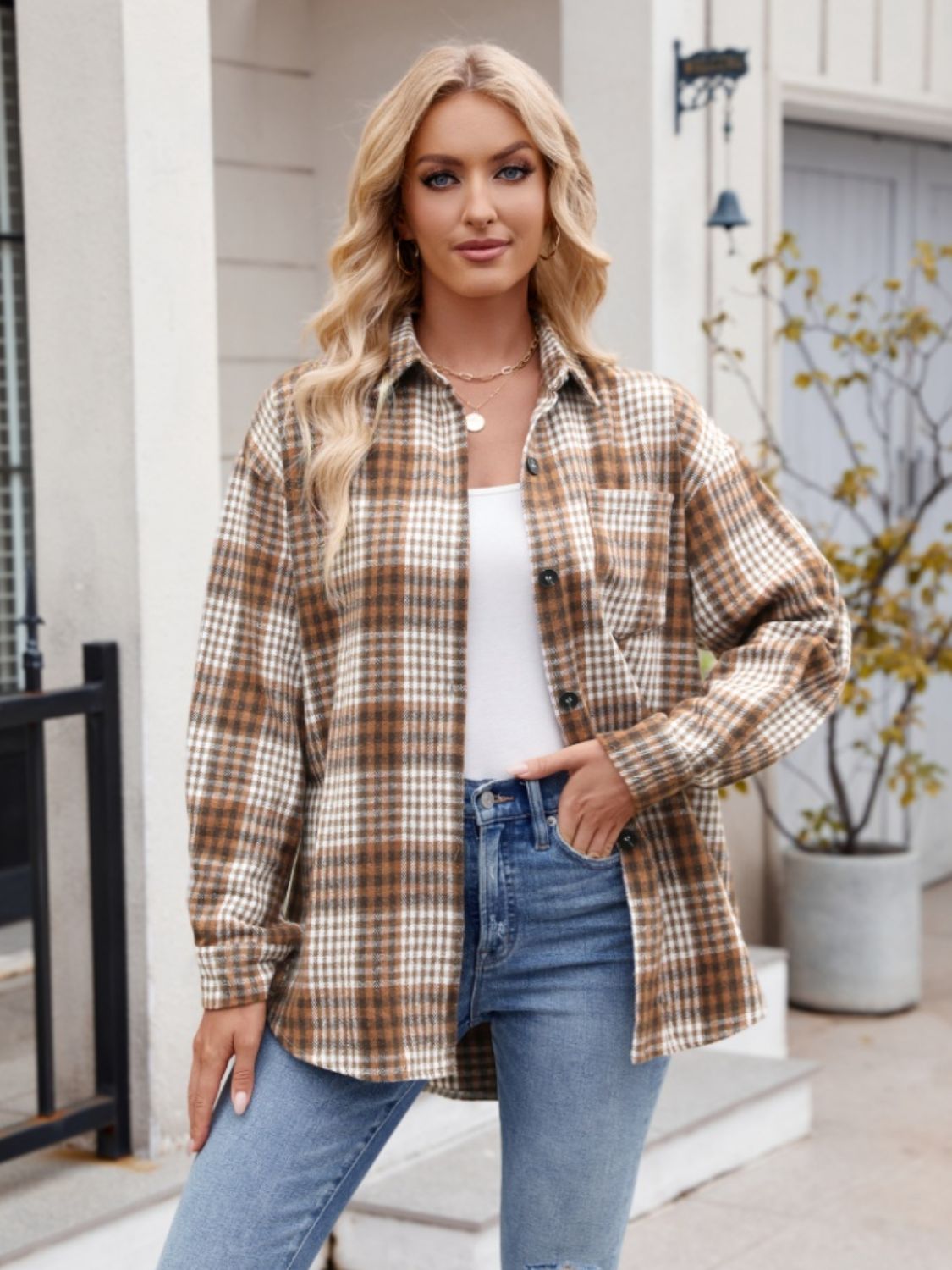 Oversized plaid shirt jacket in caramel with button front and chest pocket.