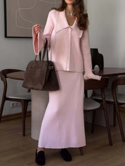 Pink ribbed knit cardigan and midi skirt set with button-down detail and wide collar.