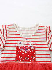 Toddler striped dress with envelope pocket and embroidered hearts, red tulle skirt.