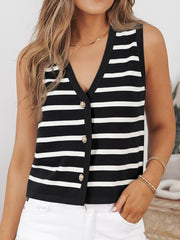 Button-front knit top in black and white Breton stripes with a V-neck and gold buttons.