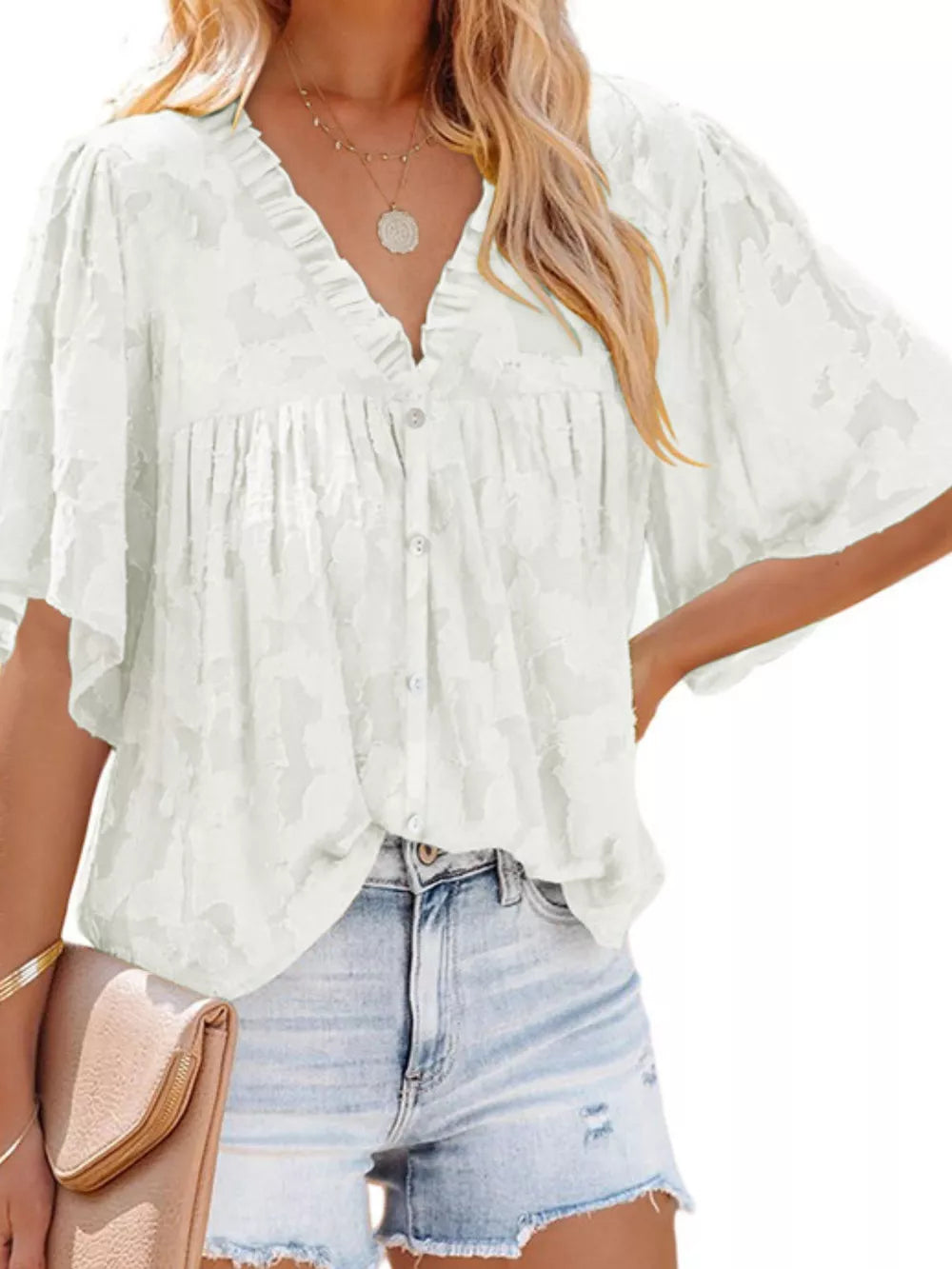 White textured V-neck button-down blouse with ruffled detail and flutter sleeves
