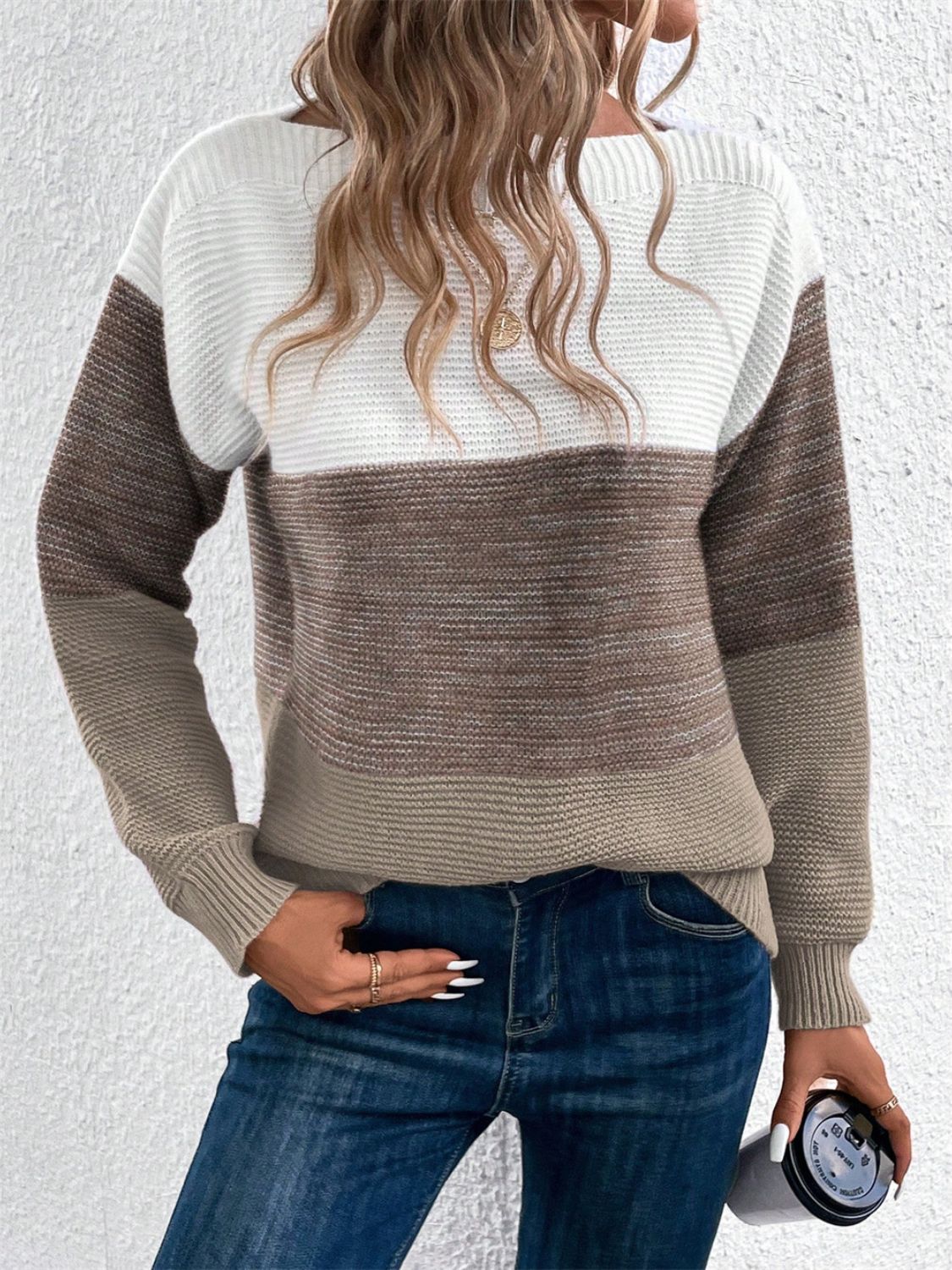 Colorblock boatneck knit sweater in white, brown, and taupe acrylic.