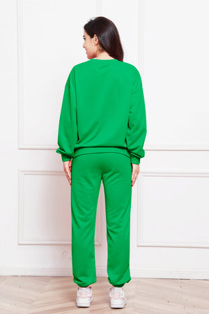 Green relaxed fit loungewear set with crewneck sweatshirt and sweatpants.