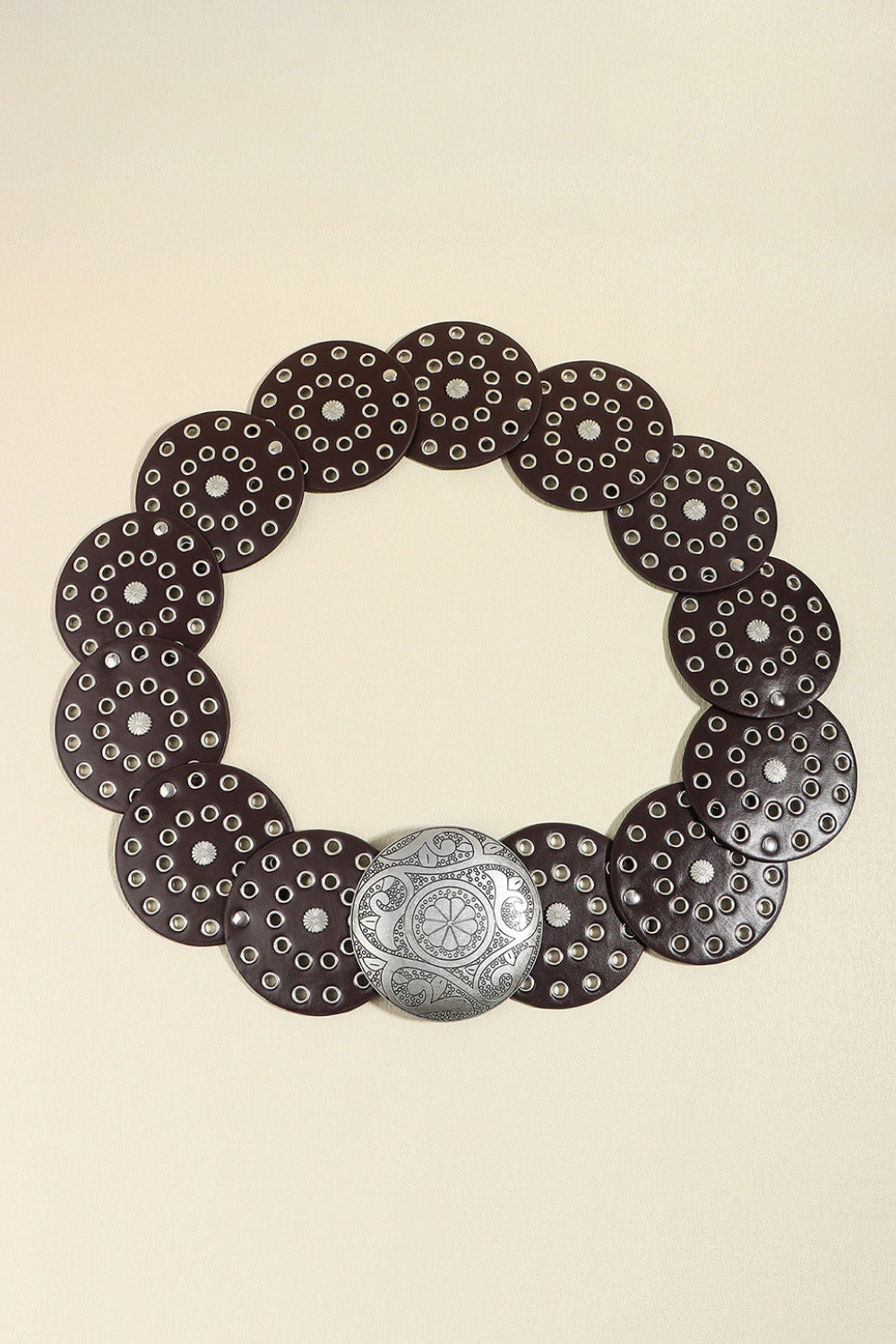 Disc-embellished belt in brown with silver buckle and eyelet details