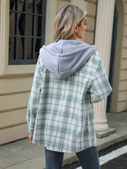 Light Green plaid shacket with contrast grey hood, buttoned front, and casual cut.