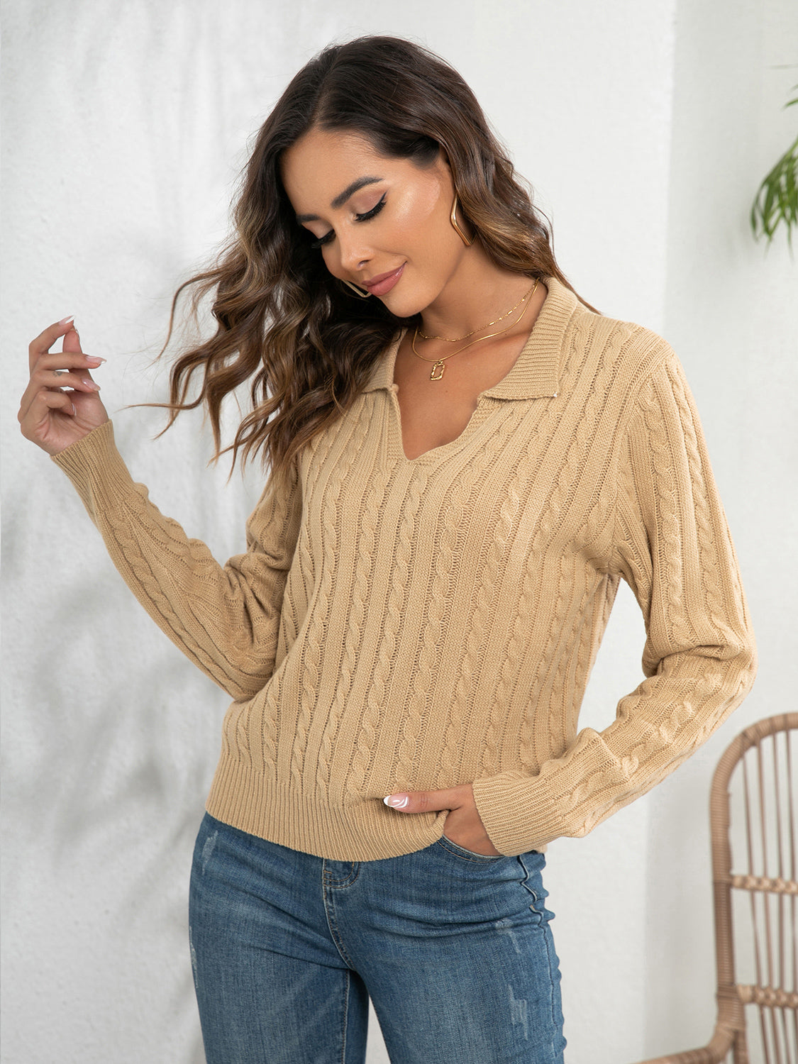 Khaki cable knit polo neck jumper with a V-neck and long sleeves.