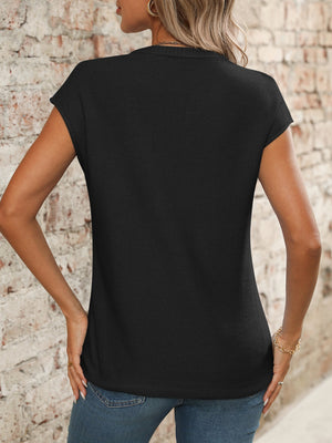 Black seamed knit sleeveless V-neck top with a textured finish.