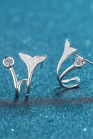 Silver stud earrings with crystal accents in a whimsical whale tail design