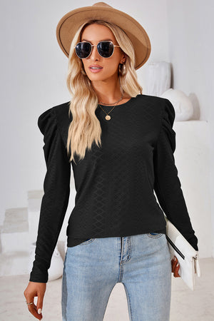 Black textured crew neck top with puff sleeves and diamond pattern