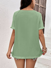 Light green raglan sleeve tee with fringed hem and sleeves