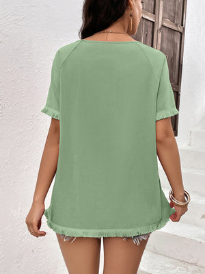 Light green raglan sleeve tee with fringed hem and sleeves