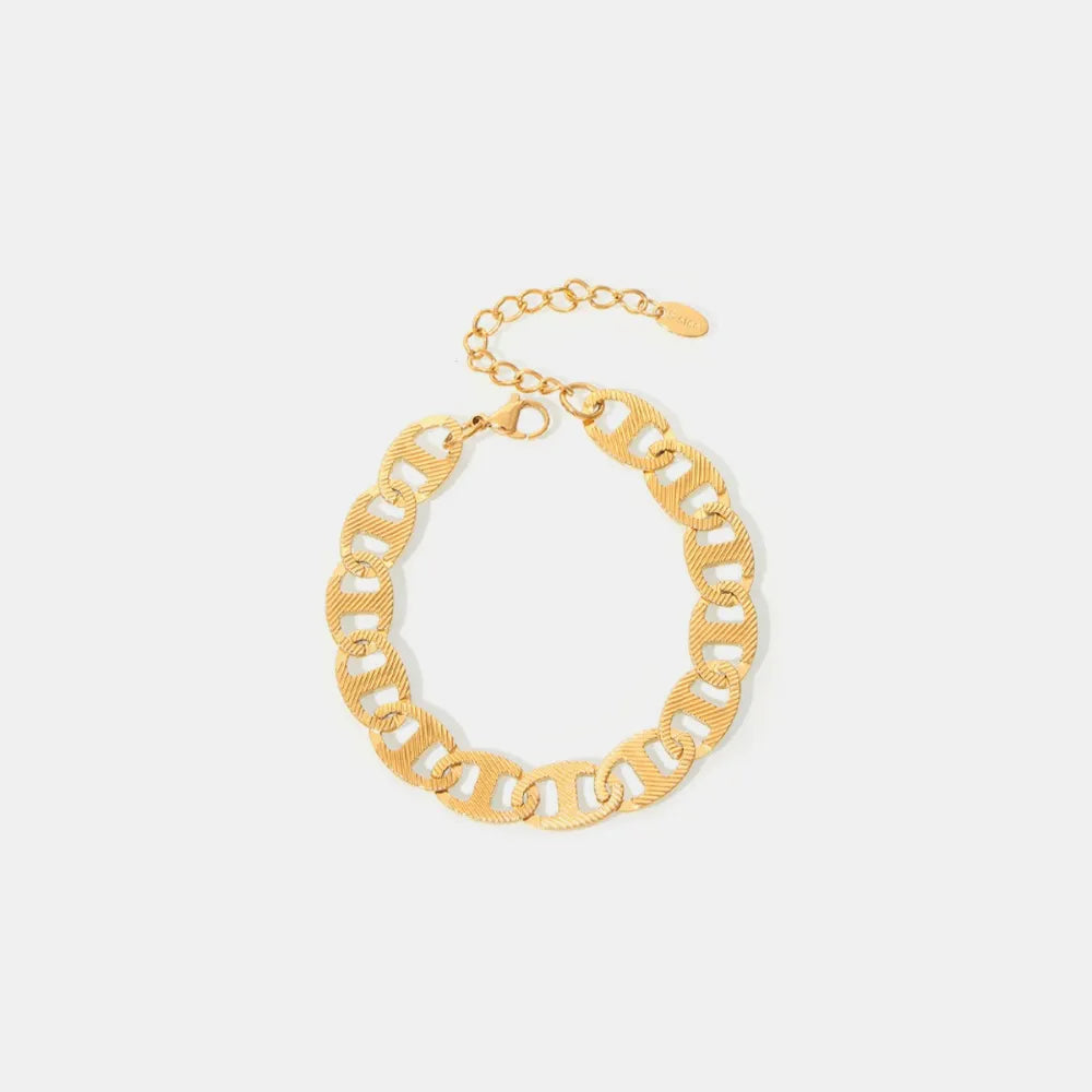Textured gold oval link bracelet with adjustable chain