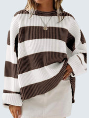 Striped oversized knit sweater in chocolate and white with crew neck and long sleeves.