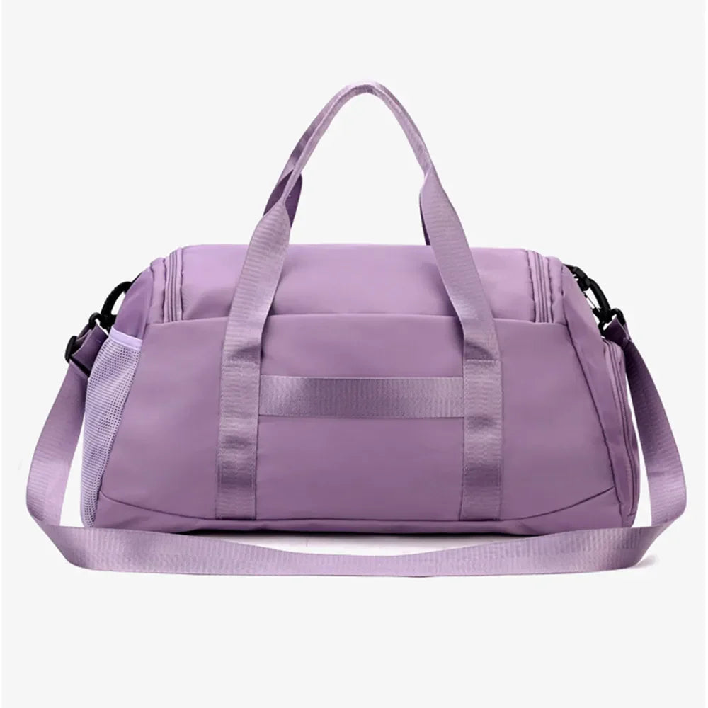 Mauve nylon duffle bag with mesh pocket and adjustable strap