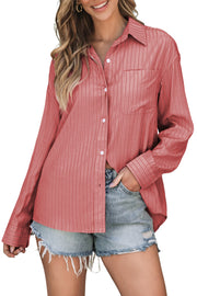 Oversized stripe oxford shirt in burnt coral with button front and chest pocket.