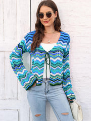 Chevron knit tie-front cardigan in blue and green with white accents, featuring a V-neck and long sleeves.