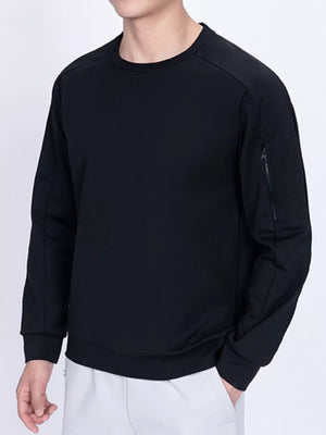 Black zippered sweatshirt with crew neck and long sleeves.