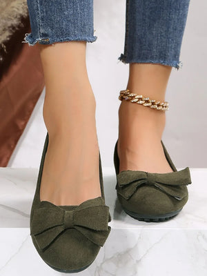 Moss suede pointed-toe flats with bow embellishment