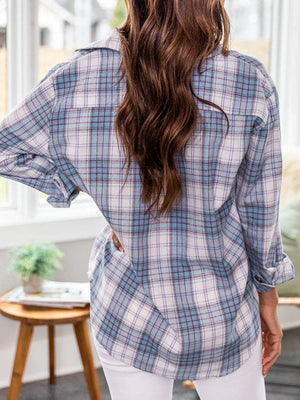 Relaxed fit plaid button-down shirt in light blue with a relaxed fit and rolled sleeves.