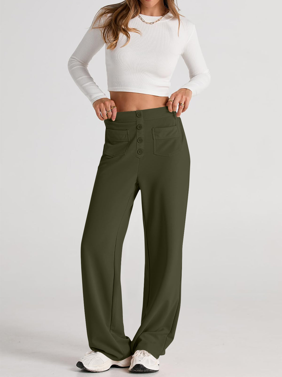 Button-front palazzo trousers in Gum Leaf green with flap pockets and a wide leg.