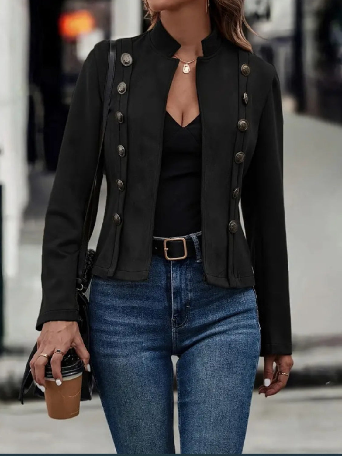 Black suede military-inspired jacket with double-breasted button detail and stand collar.
