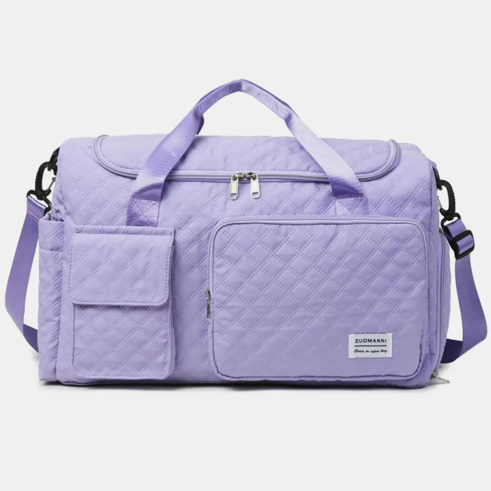 Lavender quilted duffel bag with multiple pockets and olive accents