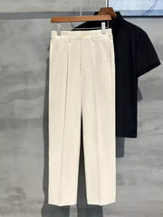 Men's ivory sweatpants with elevated seam detail and a straight leg cut.