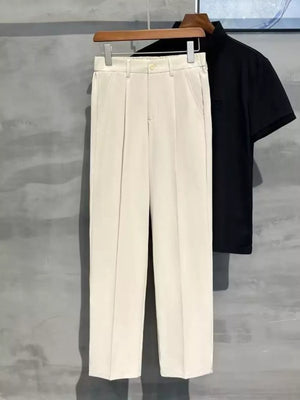 Men's ivory sweatpants with elevated seam detail and a straight leg cut.