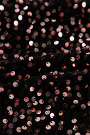 Black sequin backless blouse with rose gold sequins on textured fabric