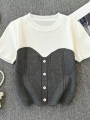 Color block knit t-shirt in white and gray with ribbed detail and button accents