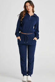 Navy ribbed crop hoodie with quarter zip and matching jogger pants with drawstring waist.
