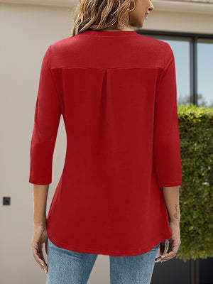 Deep Red V-neck three-quarter sleeve top with back pleat detail.