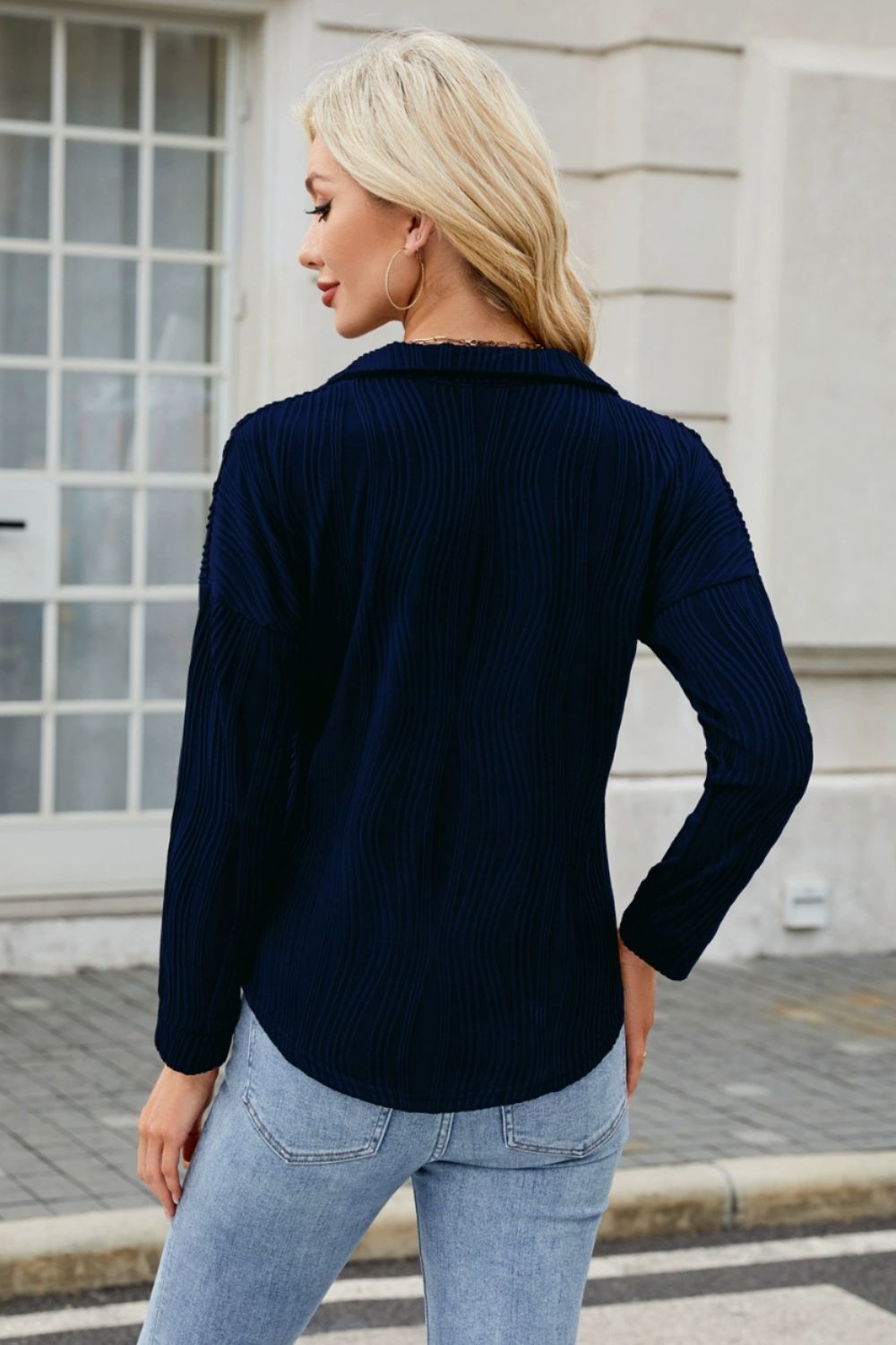 Dark Navy Pleated Wave-Effect Collared Top with long sleeves, shown from the back.