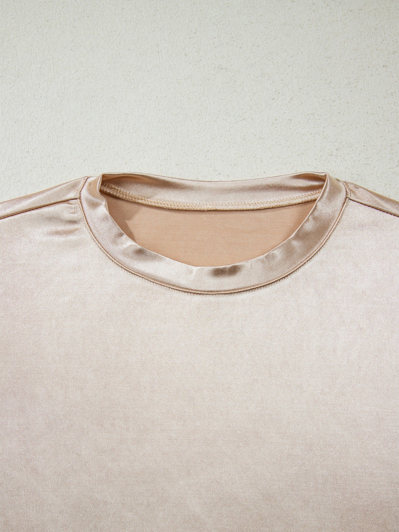 Champagne satin sleeveless tank top with crew neck
