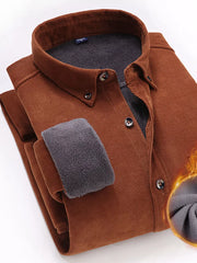 Men's brown corduroy button-down shirt with fleece lining and cuff detail.