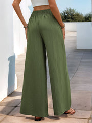 Moss textured elastic waist palazzo trousers with a wide leg