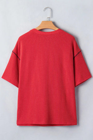 Red ribbed crew neck t-shirt with short sleeves and contrasting stitching detail.