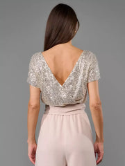 Shimmering sequin wide-leg jumpsuit with tie, apricot silver top and blush pants